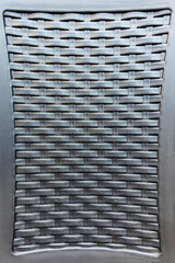 Close-up of plastic chair back pattern background
