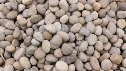 Rubble or gravel background, construction material. Exterior garden floor. Gravel pebble stone texture seamless texture for background or backdrop.
