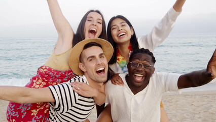 Group of diverse friends having fun at the beach. Vacation , summer, beach party