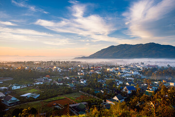 Mountains during dawn. Beautiful natural landscape in the summer time with fog