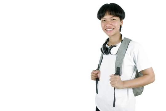 Portrait of a young student with a school bag. young woman pulling forward straps of gray hipster backpack. The teenager smiles and looks at the camera.