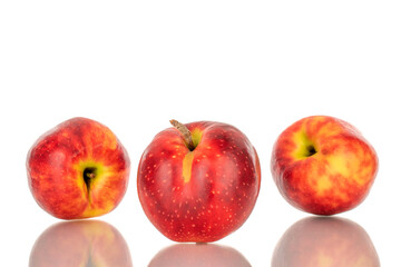 Three red apples, macro, isolated on white background.