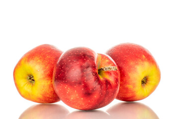 Fototapeta na wymiar Three red apples, macro, isolated on white background.