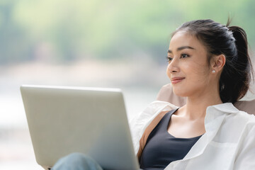 Portrait of young smiling woman looking at camera, Happy girl working relax in creative office. Successful businesswoman with copy space, Programmers cooperating at IT company developing apps