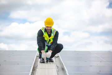 Male engineering teams install solar panels at solar power generating station, Professional engineer installing photovoltaic panel system using screwdriver, green energy and sustainable living