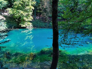 Bright blue lake in the town of Blautopf, Germany