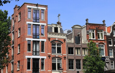 Naklejka premium Amsterdam Oudezijds Voorburgwal Canal Typical House Facades View, Netherlands