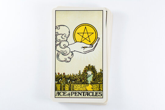 Madrid, Spain - May 22, 2023: Tarot cards, Rider Waite tarot cards, the ace of pentacles vintage card in the foreground.