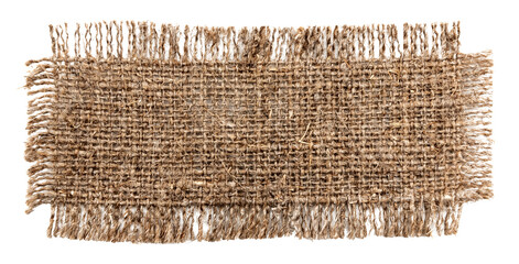Burlap texture. A piece of torn burlap on a white background. Canvas. Packing material
