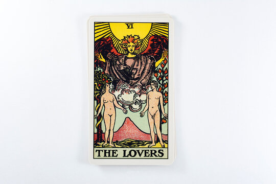 Madrid, Spain - May 22, 2023: Tarot cards, Rider Waite tarot cards, the lovers vintage card in the foreground.
