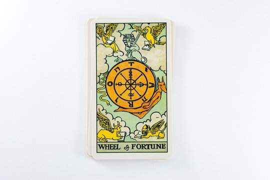 Madrid, Spain - May 22, 2023: Tarot cards, Rider Waite tarot cards, the wheel of fortune vintage card in the foreground.