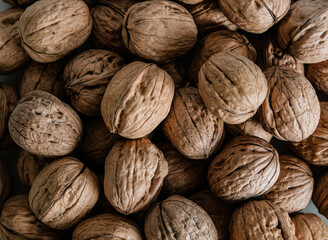 Fresh walnuts background. Horizontal view of walnut shells.