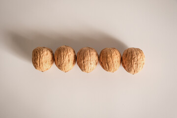 Shelled walnuts. Being smart vs. stupid. Accurate solutions lead to success, efficiency, smartness,...