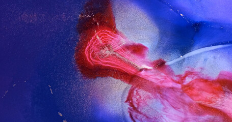 Blue red paint splash abstract background. Neon blue-red splashing, flowing bright ink. Shiny silver liquid pattern texture. Red dye spread, flow on purple backdrop. Fluid art. Vertical artwork