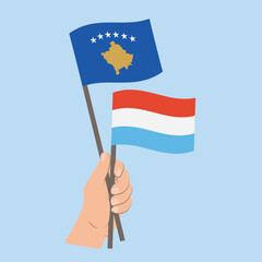 Flags of Kosovo and Luxembourg, Hand Holding flags