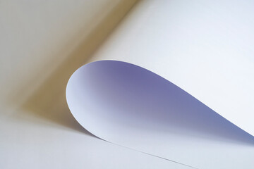 A large sheet of white paper with a yellow shadow.
