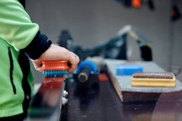 Process prepares sliding surface of cross-country skis for winter sports competitions. Remove wax service workshop