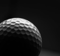 Closeup of golf ball. In B-W