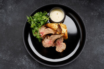 delectable ribs with grilled vegetable salad and savory sauce