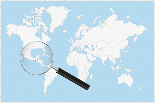 Magnifying glass showing a map of Guatemala on a world map.