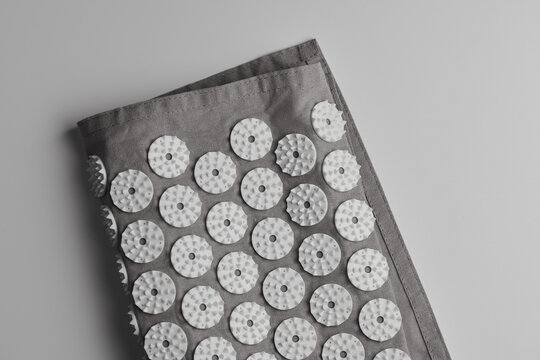 Tibetan massage acupuncture mat with needles. Kuznetsov applicator isolated on white background. Alternative medicine concept
