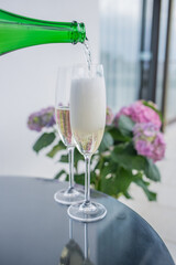 champagne pouring into glass