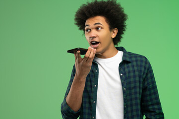 Young african american recording a voice message