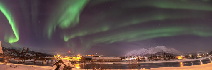 Panoramic landscape aurora borealis views in northern Canada, Yukon Territory during winter time...