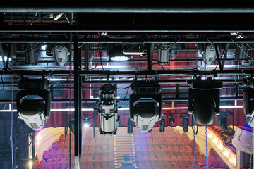 Technical equipment at the backstage of theater. Stage spot lighting rigging structure for a live musical and theater events