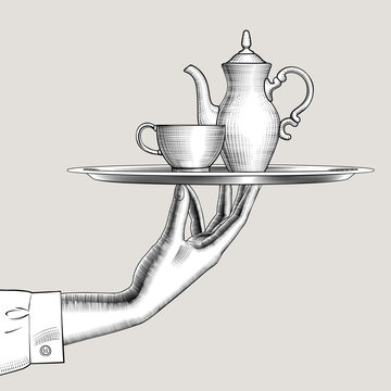 Female hand holding a round tray with coffee or tea pot and cup. Vintage engraving stylized drawing. Vector illustration