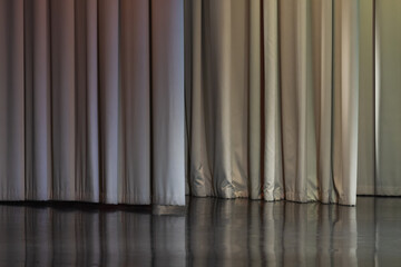 Empty stage with closed white curtain, background texture