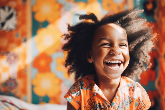 Portrait of adorable joyful little Black girl in her room laughing.