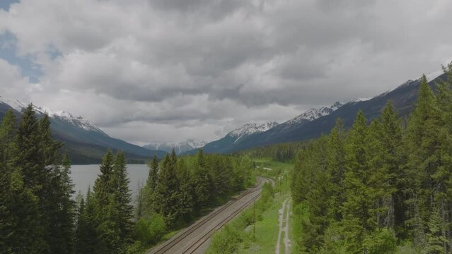 Rising above the Jasper railway to reveal the Canadian Rockies
