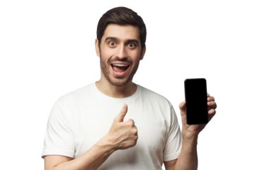 Excited screaming WOW young man in white t-shirt presenting blank black smartphone screen and showing thumbs up gesture