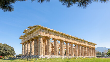 Fototapeta na wymiar Paestum, Italy; May 30, 2023 - The Temple of Hera at Paestum, which contains some of the most well-preserved ancient Greek temples in the world.