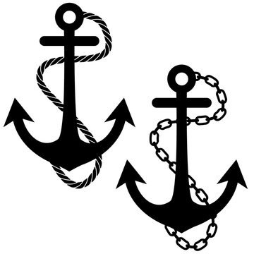 Set of anchors surrounded by rope and chains.