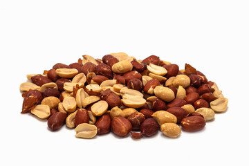Roasted peanuts in the husk on a white background.
