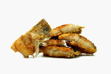 Pieces of fried fish on a white background.