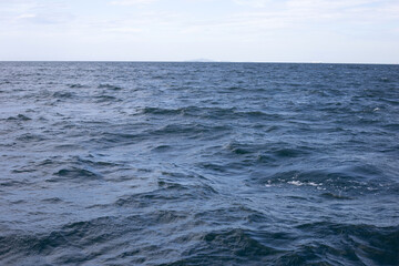 Blue sea water surface texture. Blue ocean summer