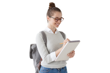 Female student taking notes with pencil and notebook