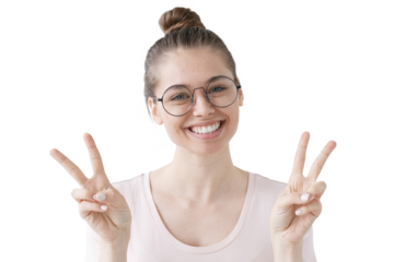 Happy girl showing victory gesture with both hands