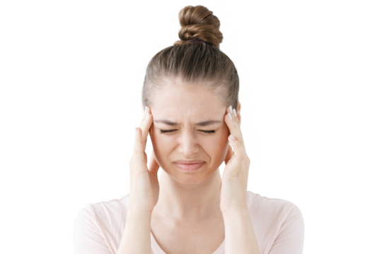 Young woman suffering from severe headache, pressing fingers to temples, closing eyes in order to relieve pain