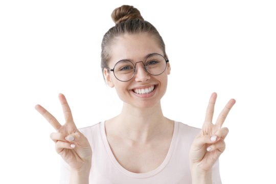 Happy girl showing victory gesture with both hands