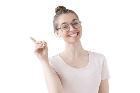 Smiling happy girl pointing to the left