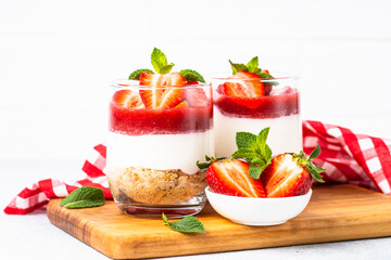 Cheesecake in a glass. Strawberry cheesecake, healthy dessert, no baking in jars.