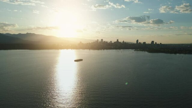Vancouver skyline silhouettes in beautiful morning light, aerial view