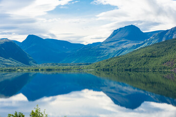 Fototapeta na wymiar Reflection on a beutiful lake in Norway