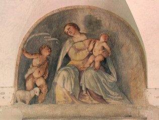 Madonna con Bambino e San Giovanni fanciullo; affresco del Romanino nella foresteria dell'abbazia olivetana di Rodengo Saiano
