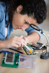 woman working on pc electronics