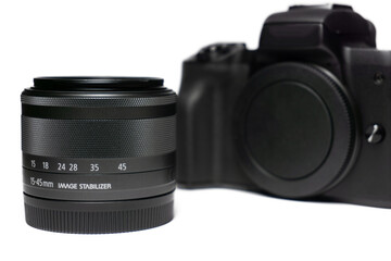 Photo camera body with zoom lens isolated on white background. Media technology and photography concept, photography equipment, camera matrix board. Digital SLR camera, dslr camera, photography, 